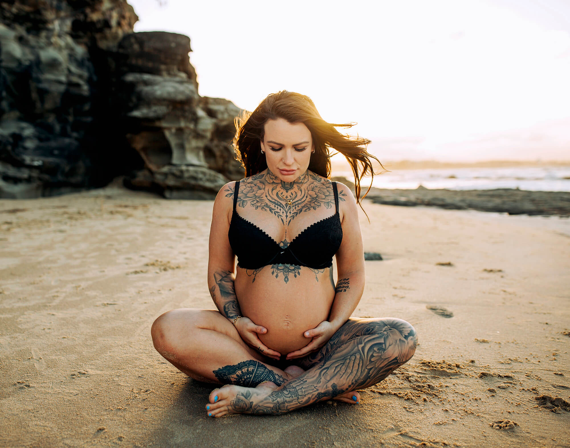 Photographer Sunshine Coast | Sunshine Coast family photographer | Sunshine Coast Photographer pregnant tattooed mum posing on a sunshine coast beach for her maternity session